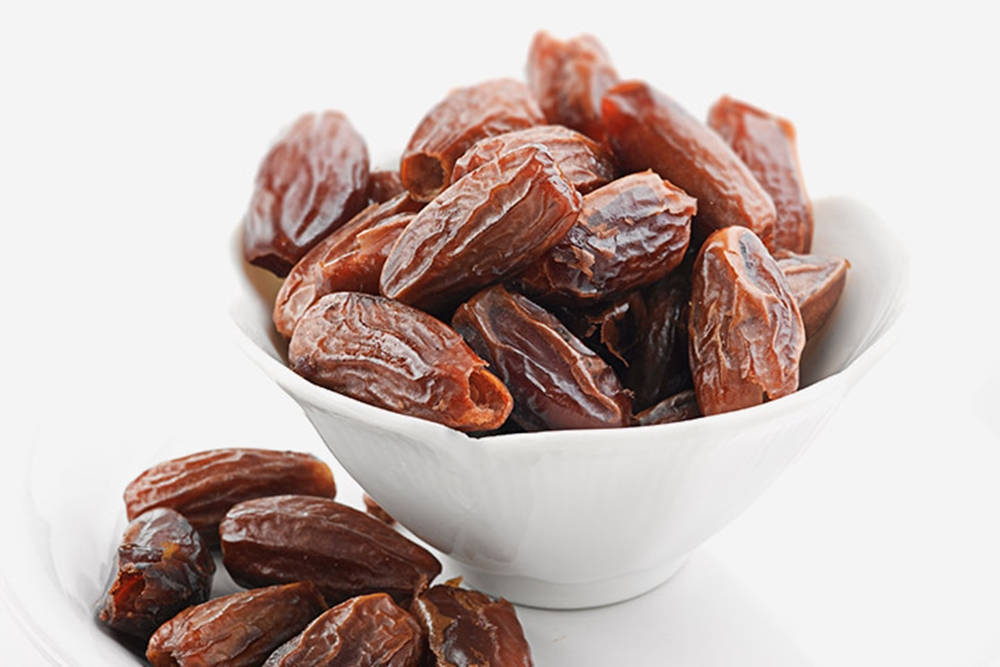 Bowl Of Dates Fruits Wallpaper