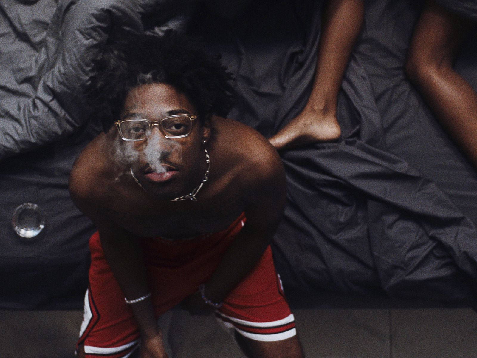 Brent Faiyaz Red Shorts Smoking Wallpaper