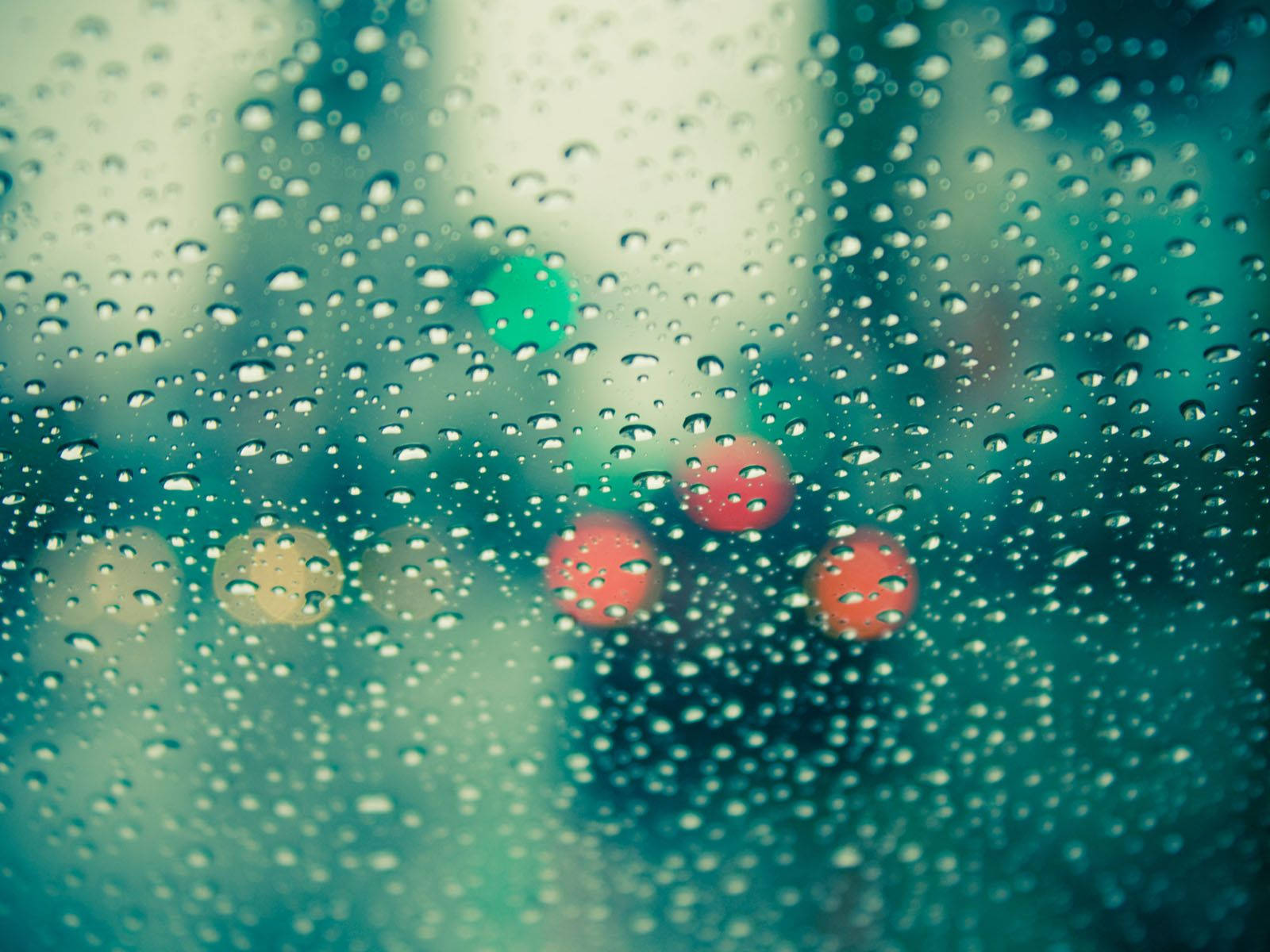 Bright Raindrops On A Car Glass Window Wallpaper