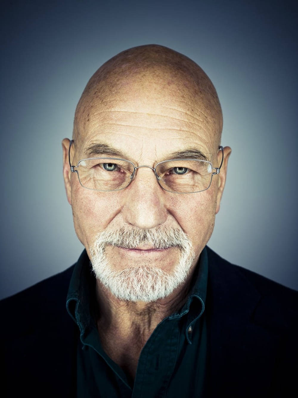 British Actor Patrick Stewart Donning Transparent Eyeglasses Wallpaper