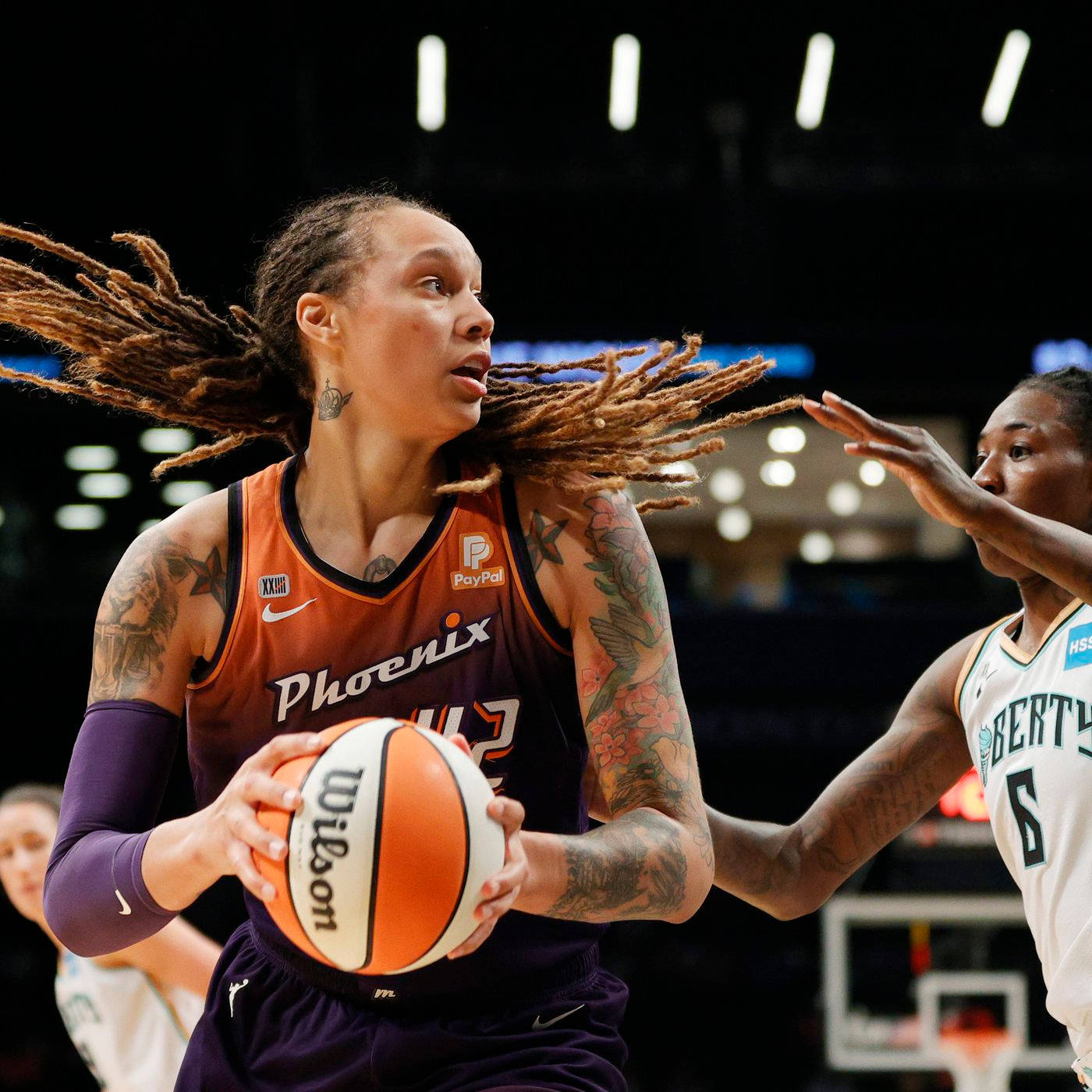 Brittney Griner Holding Ball Defending Wallpaper