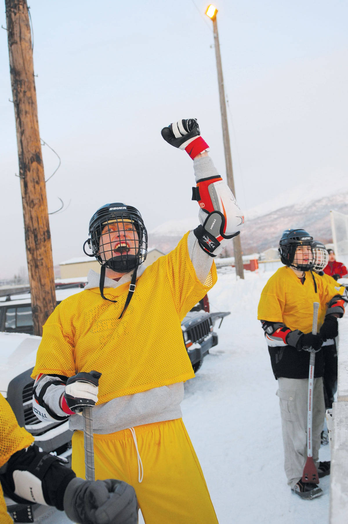 Broomball Yellow Team Player Wallpaper