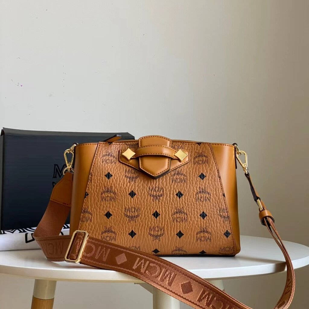 Brown Mcm Ladies Bag Wallpaper