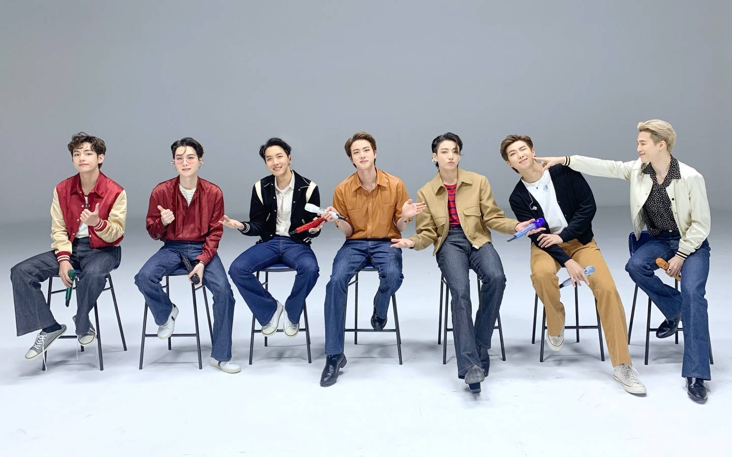 Bts Desktop On Row Of Stool Chairs Wallpaper