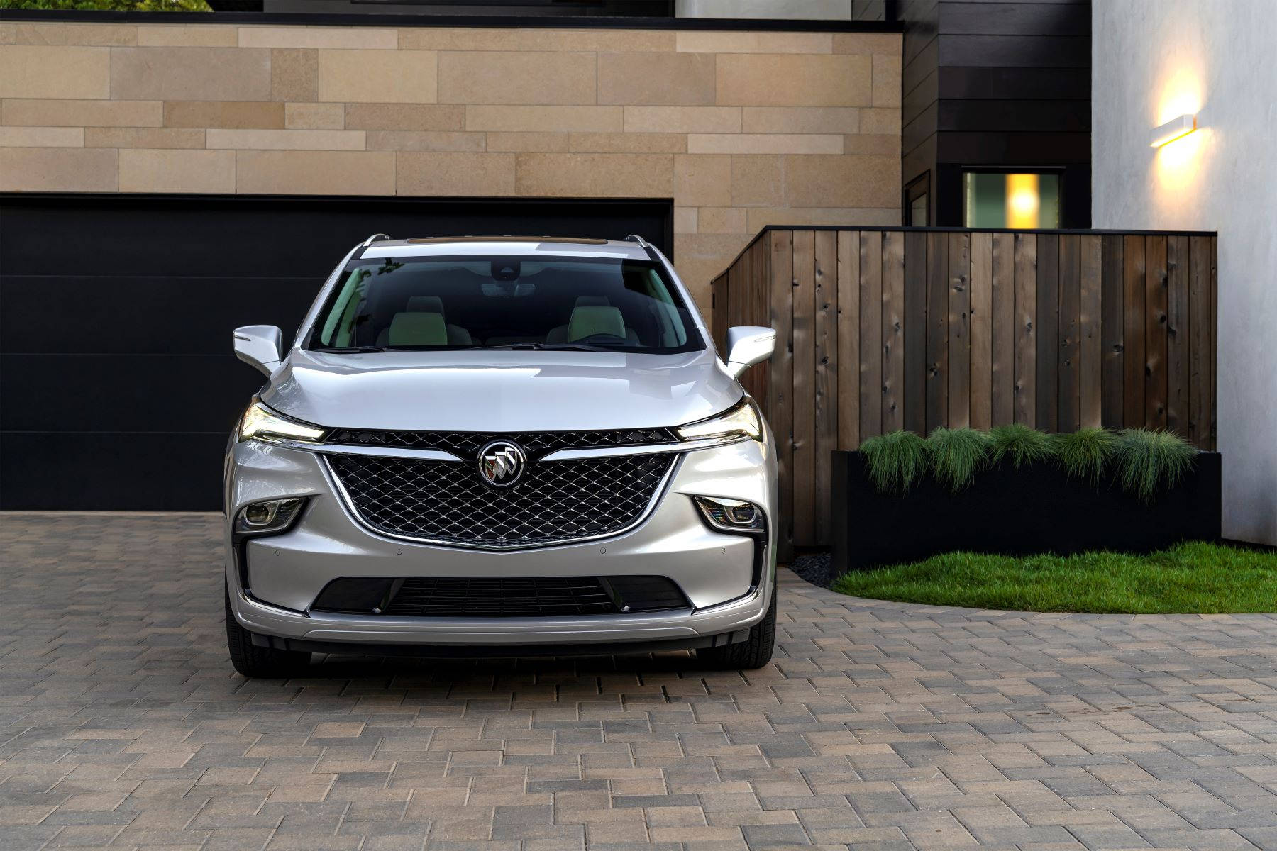 Buick Enclave At A Home Garage Wallpaper