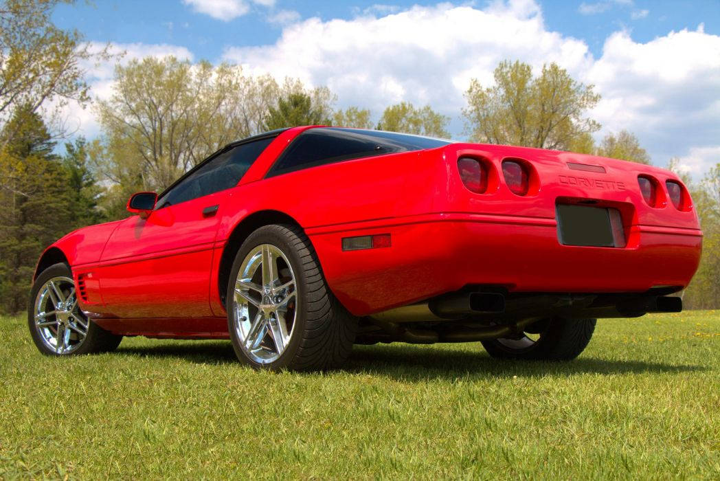 C4 Corvette On Grass Wallpaper