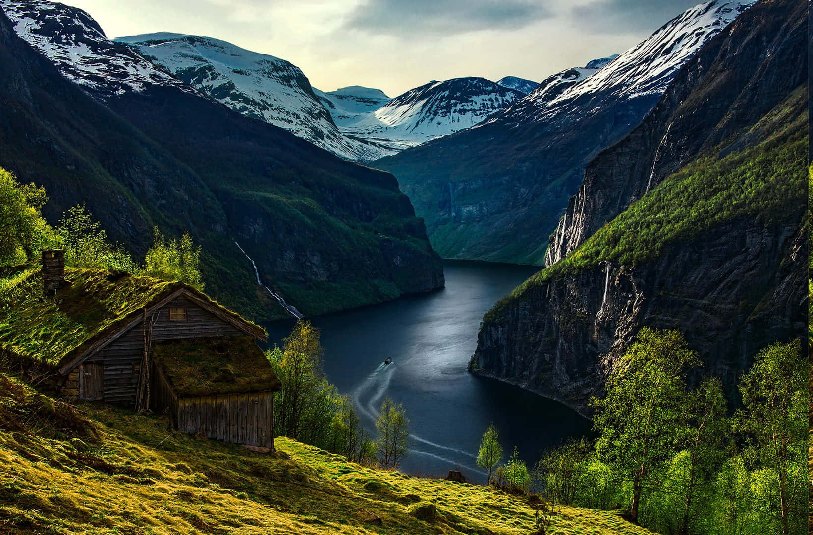 Cabin On A Hill Overlooking A River Wallpaper