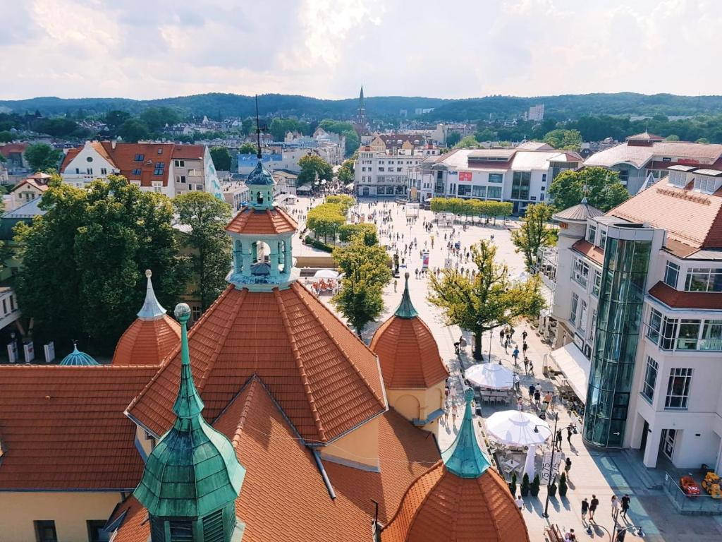 Caption: Aerial View Of Sopot Centrum Near The Crooked House, Poland Wallpaper