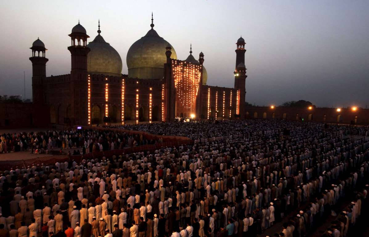 Caption: Bustling Crowd In Vibrant Lahore Wallpaper