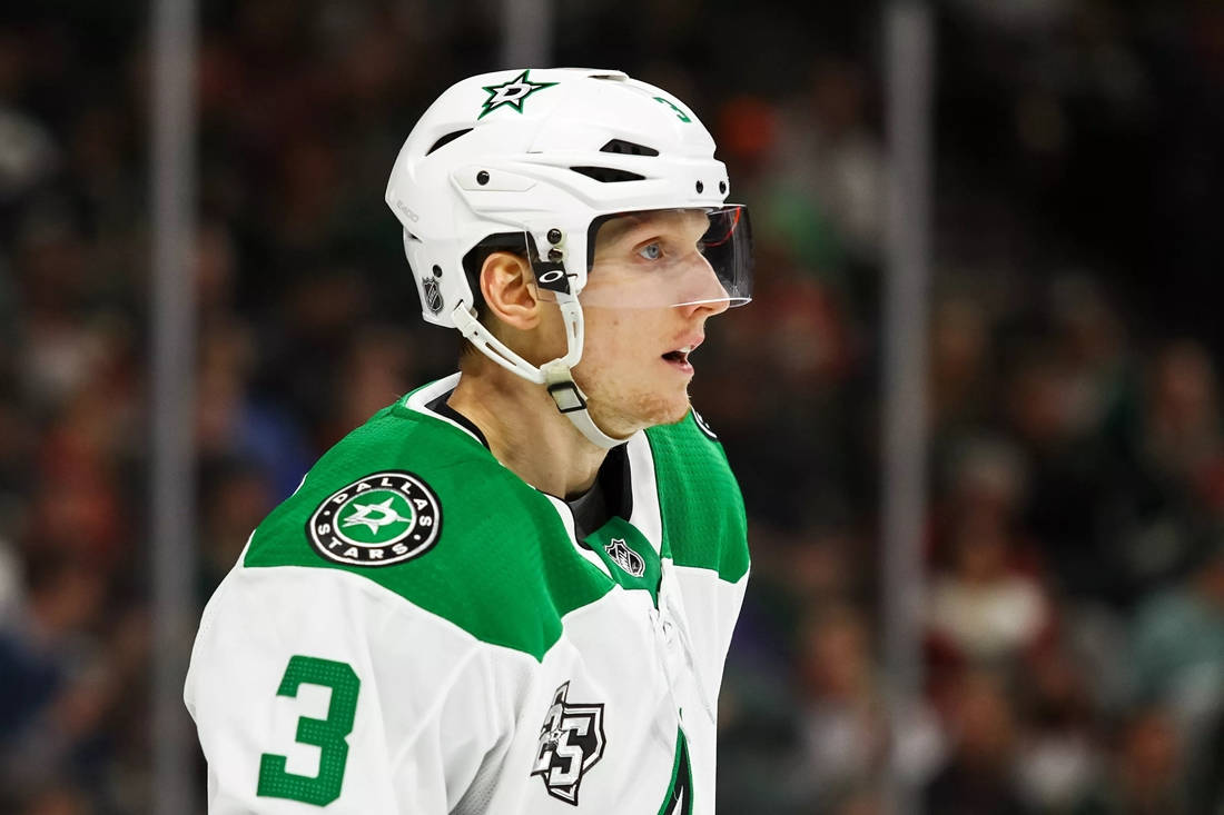 Caption: Dallas Stars Defenseman - John Klingberg In Action Wallpaper