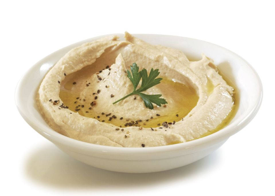 Caption: Delicious Hummus Served In A White Bowl Wallpaper