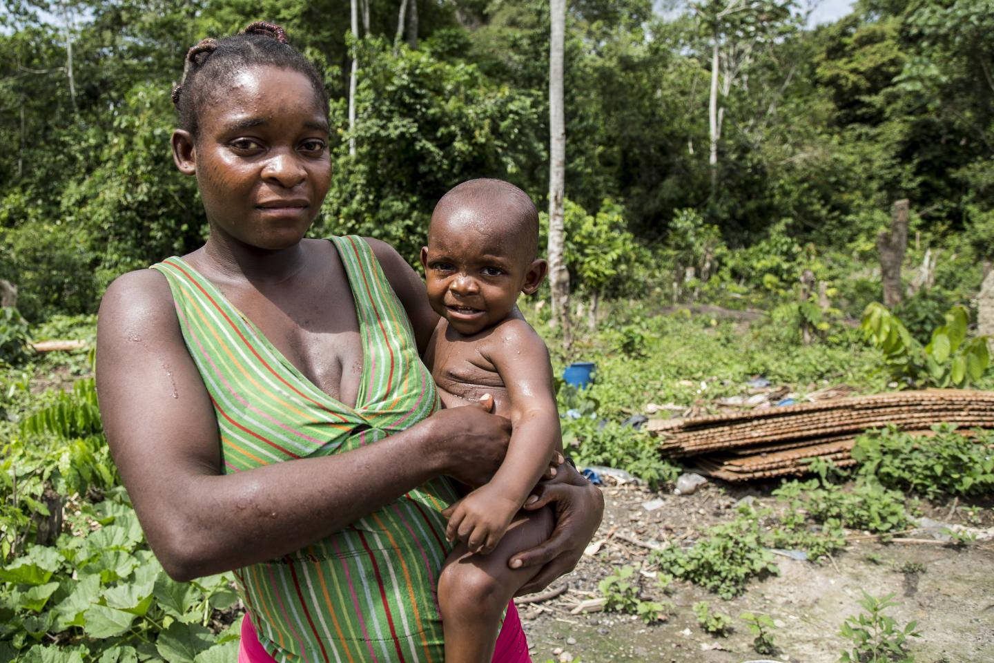 Caption: Embracing Maternal Love, Gabon Wallpaper