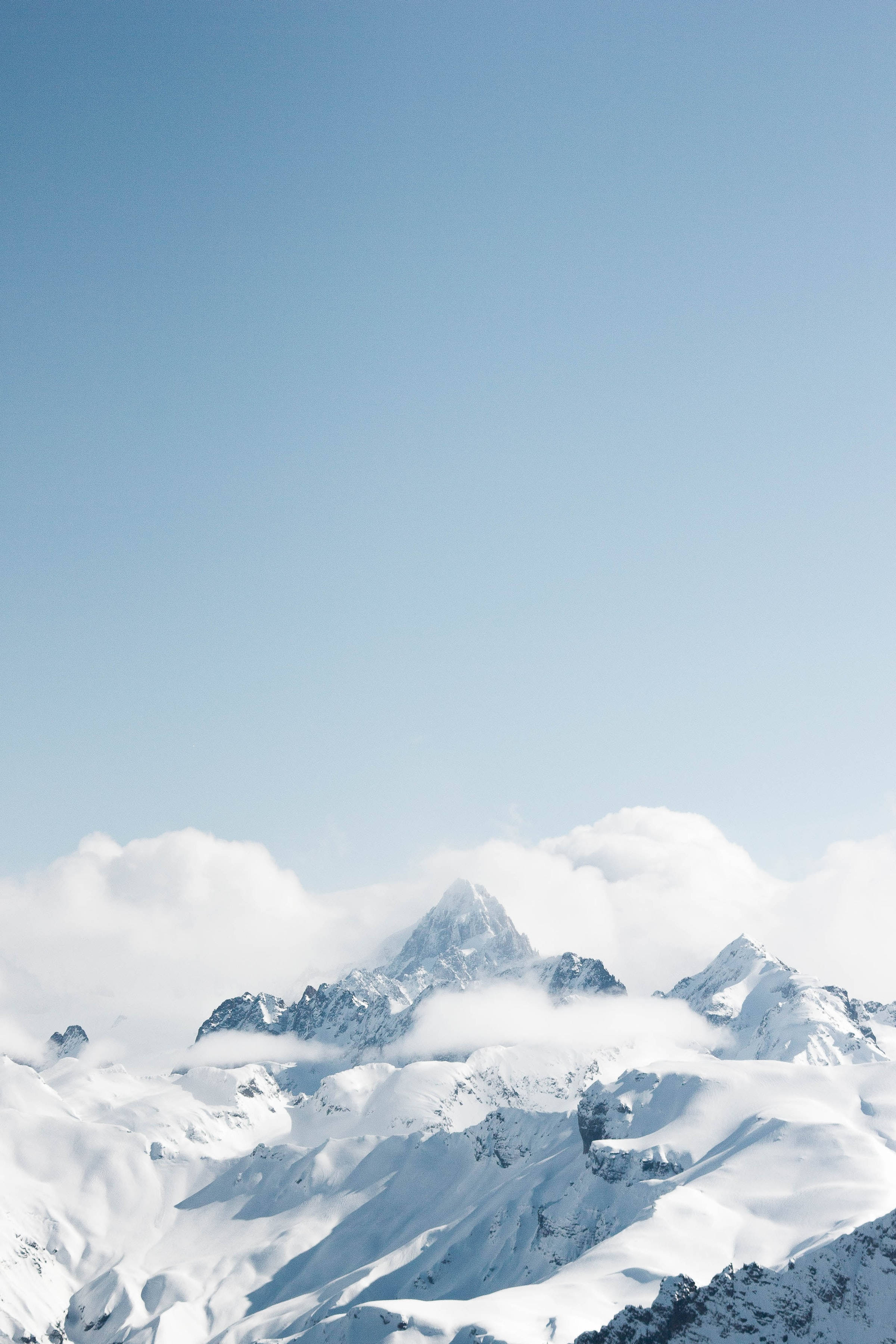 Caption: Enchanting Blue Aesthetic- Mountain Snow Under The Sky Wallpaper
