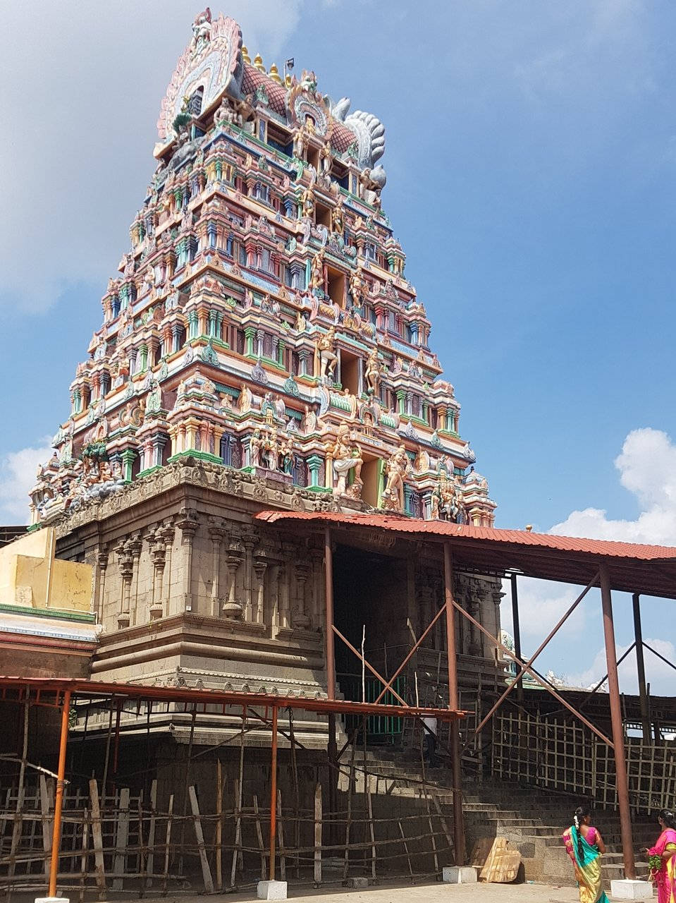 Caption: Enchanting Murugan Temple Under The Sky Wallpaper