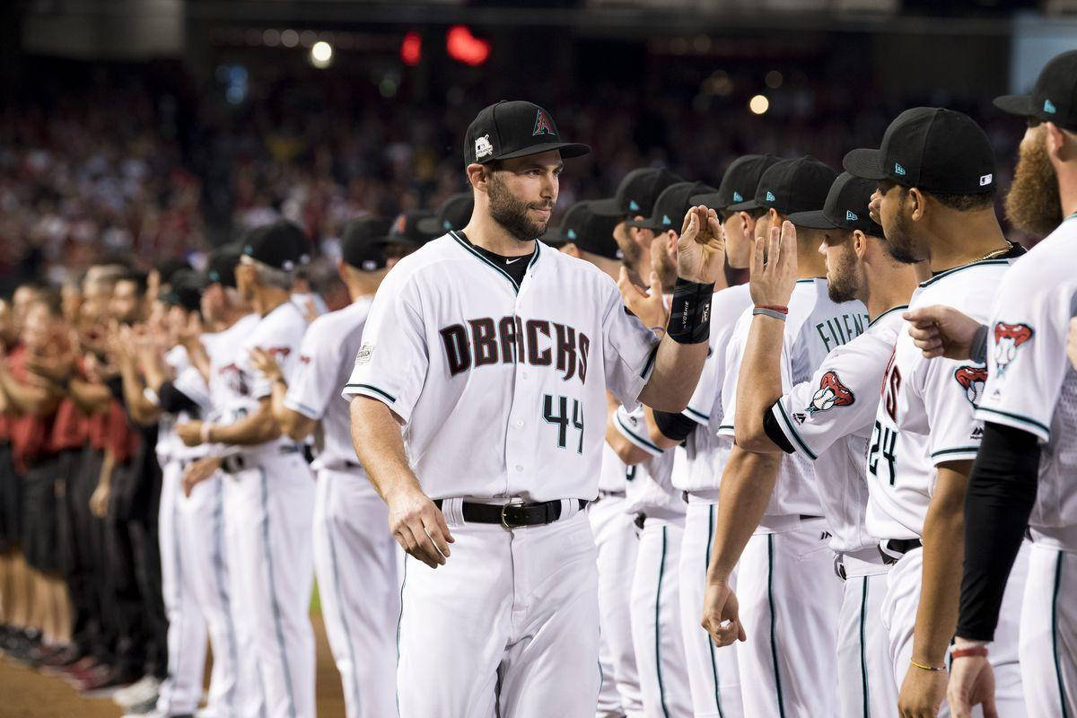 Caption: Paul Goldschmidt Celebrating A Winning Moment With Teammates Wallpaper