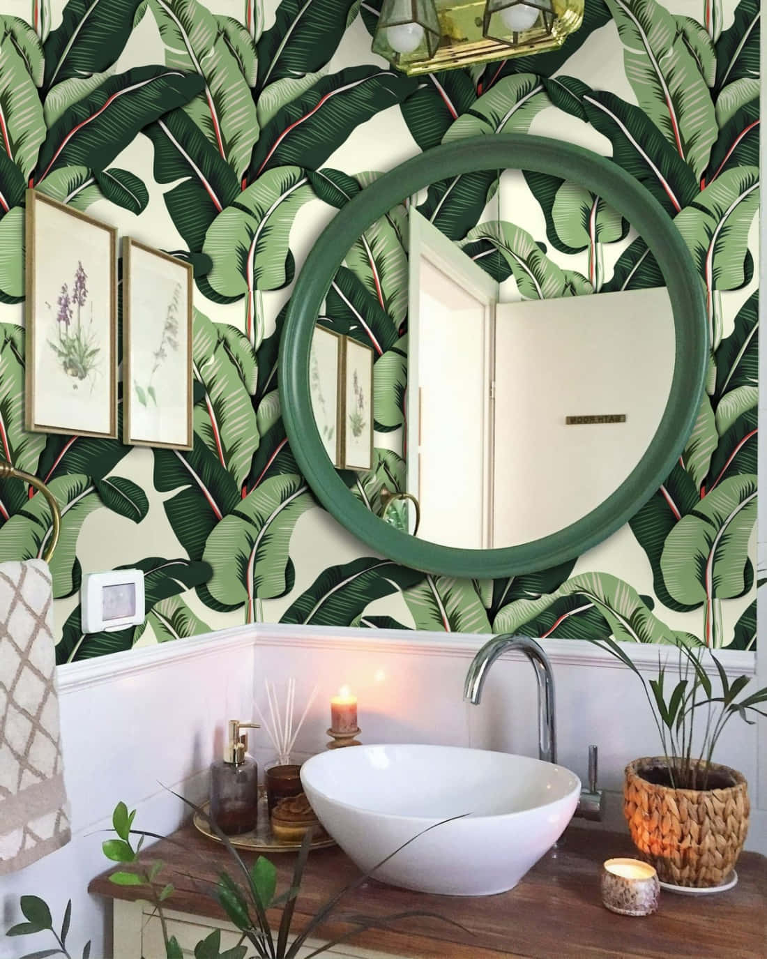 Caption: Refreshing Tropical Bathroom With Green Leafy Walls Wallpaper
