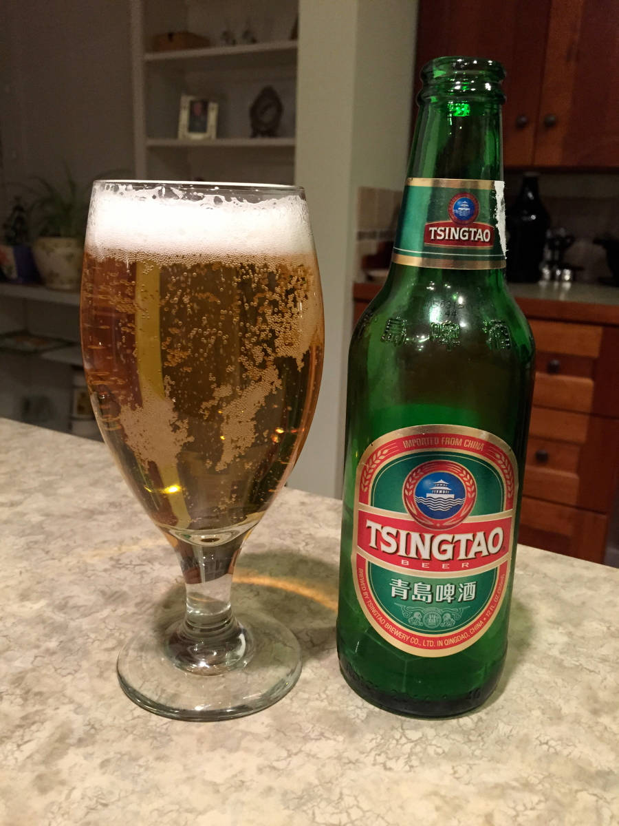 Caption: Refreshing Tsingtao Beer - China's Finest Lager Wallpaper