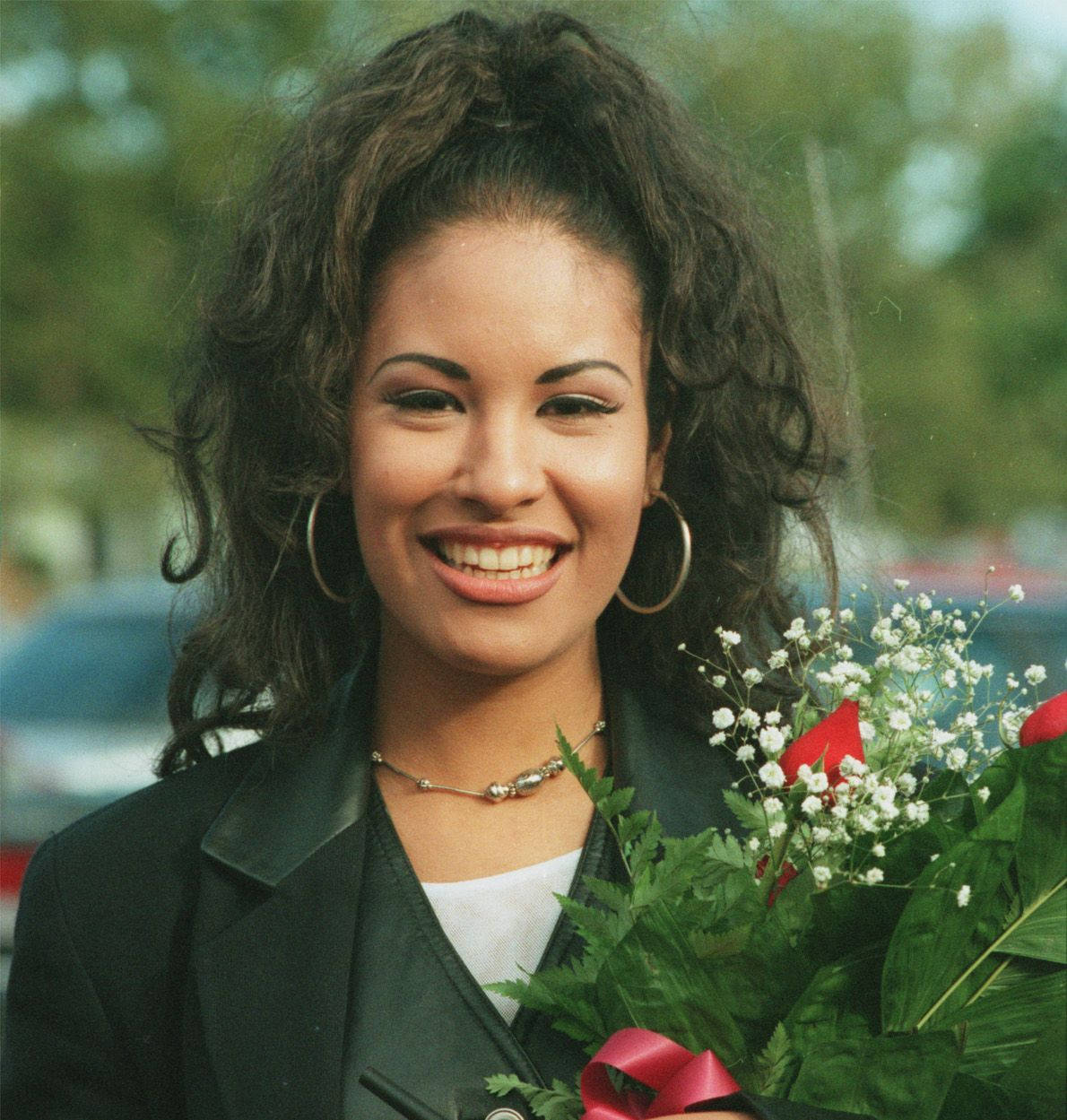 Caption: Selena Quintanilla Rocking A High Ponytail Wallpaper