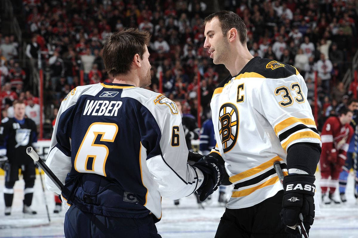 Caption: Shea Weber And Zdeno Chara Shaking Hands Post-game Wallpaper