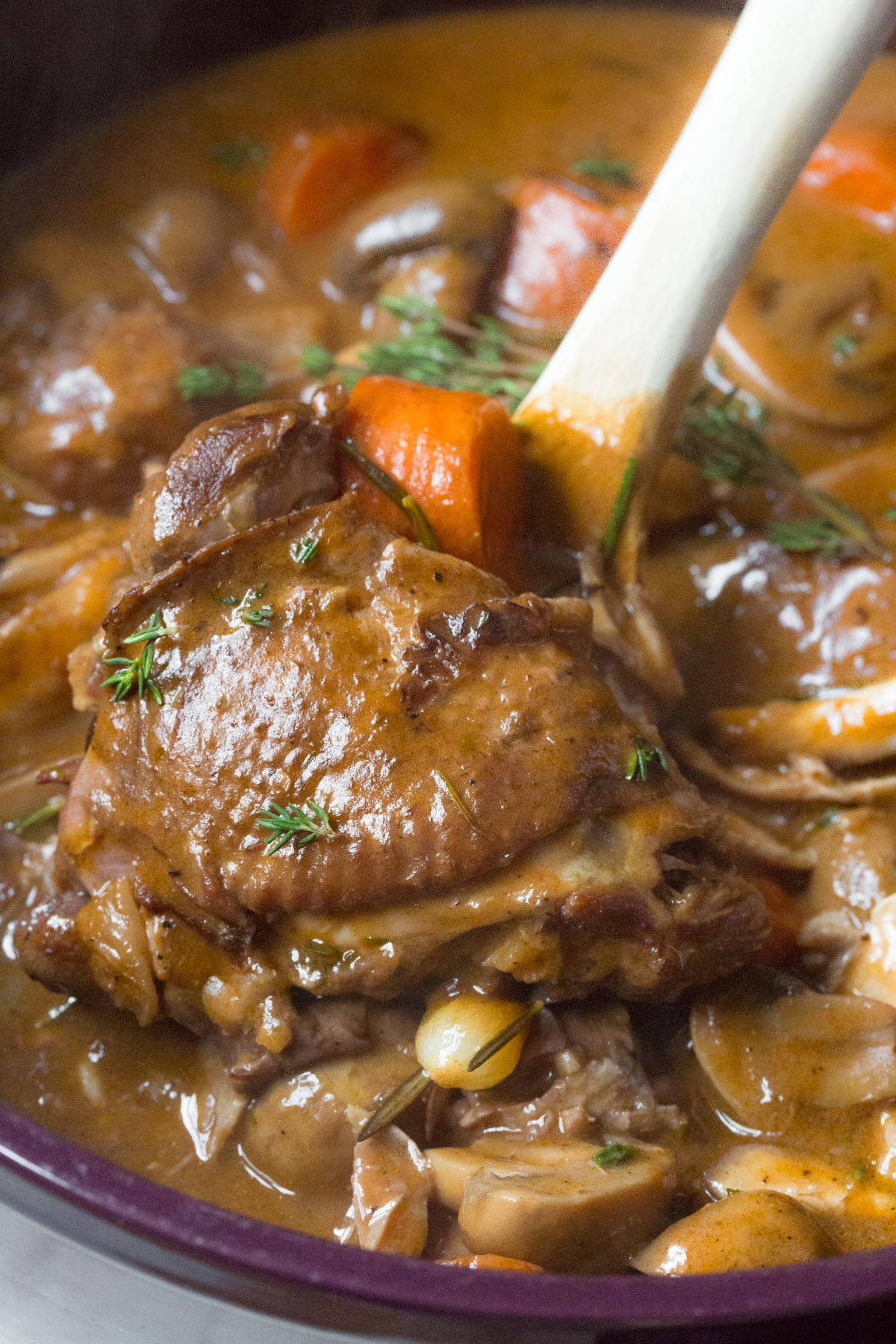 Caption: Spoonful Of Delicious Coq Au Vin Wallpaper