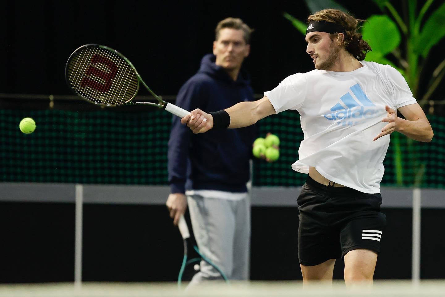 Caption: Stefanos Tsitsipas Alongside Mentor Thomas Enqvist. Wallpaper