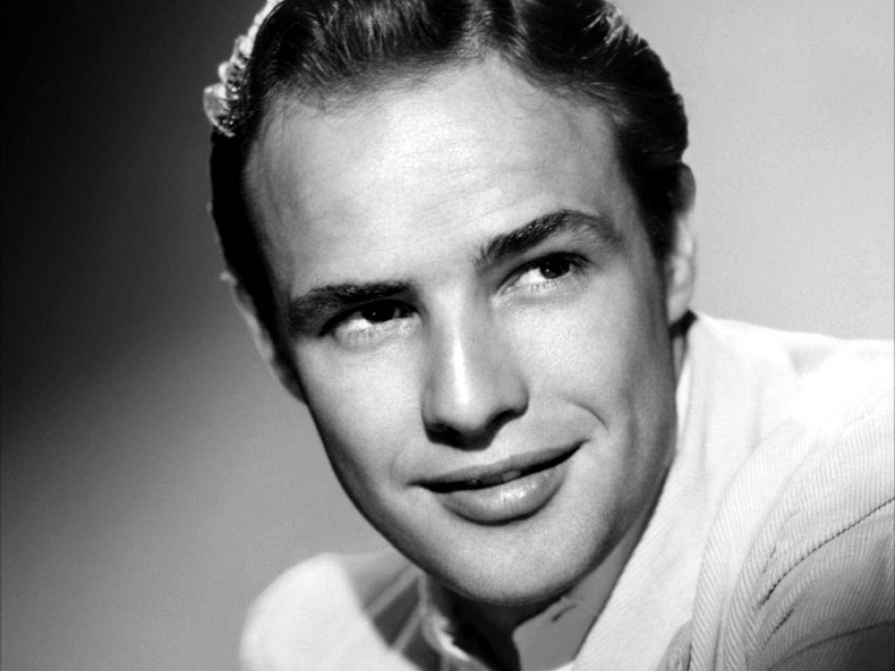 Captivating Smile Of Marlon Brando Wallpaper