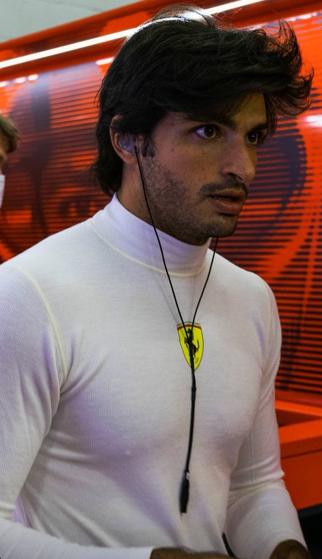 Carlos Sainz Jr Wearing Earphones Wallpaper