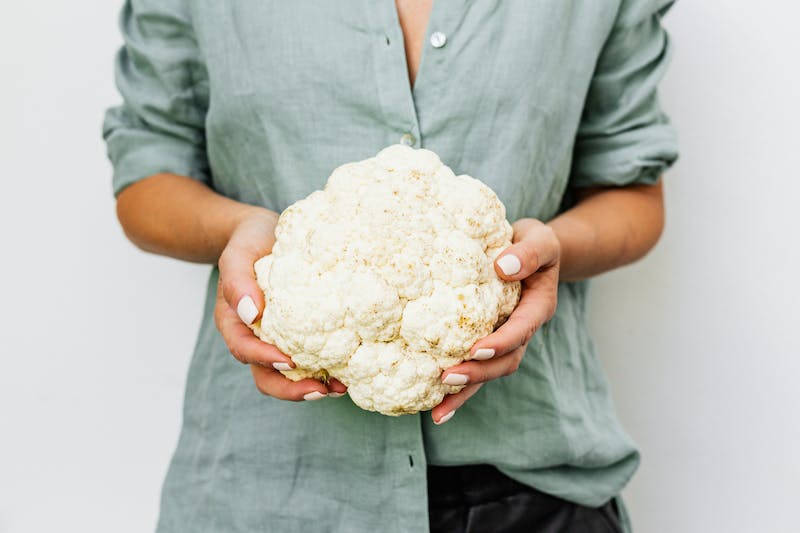 Cauliflower Holding Wallpaper