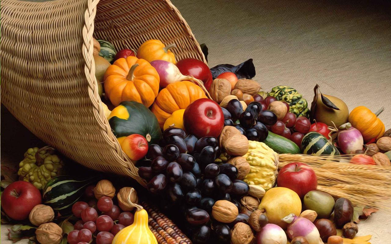 Celebrating A Thanksgiving Harvest Of Fruits Wallpaper