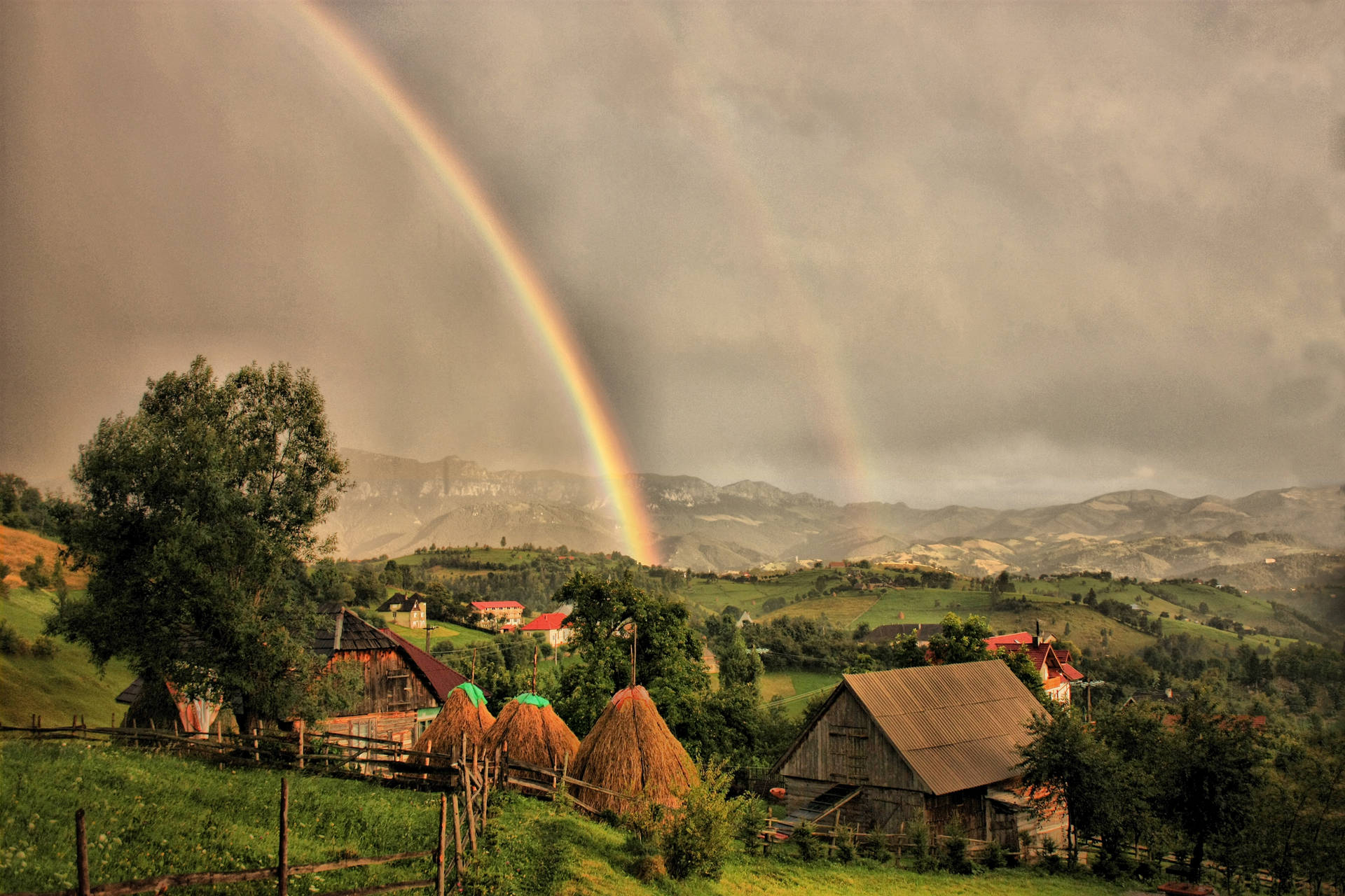 Celebrating Diversity With A Rainbow Of Native Houses Wallpaper