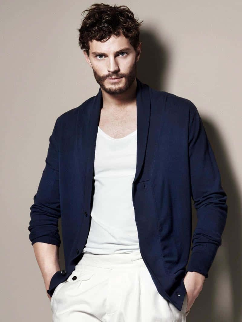 Charismatic Jamie Dornan Striking A Pose. Wallpaper