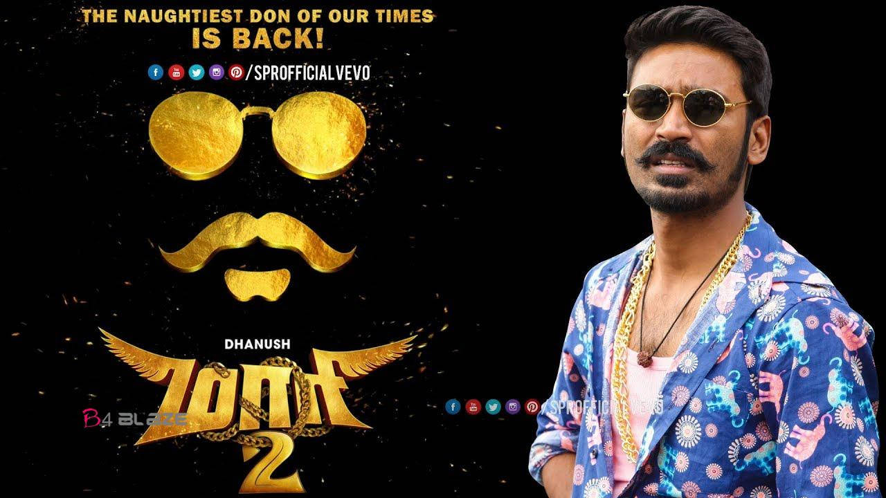 Charismatic Maari Showcasing His Attitude In A Blockbuster Movie Poster Wallpaper