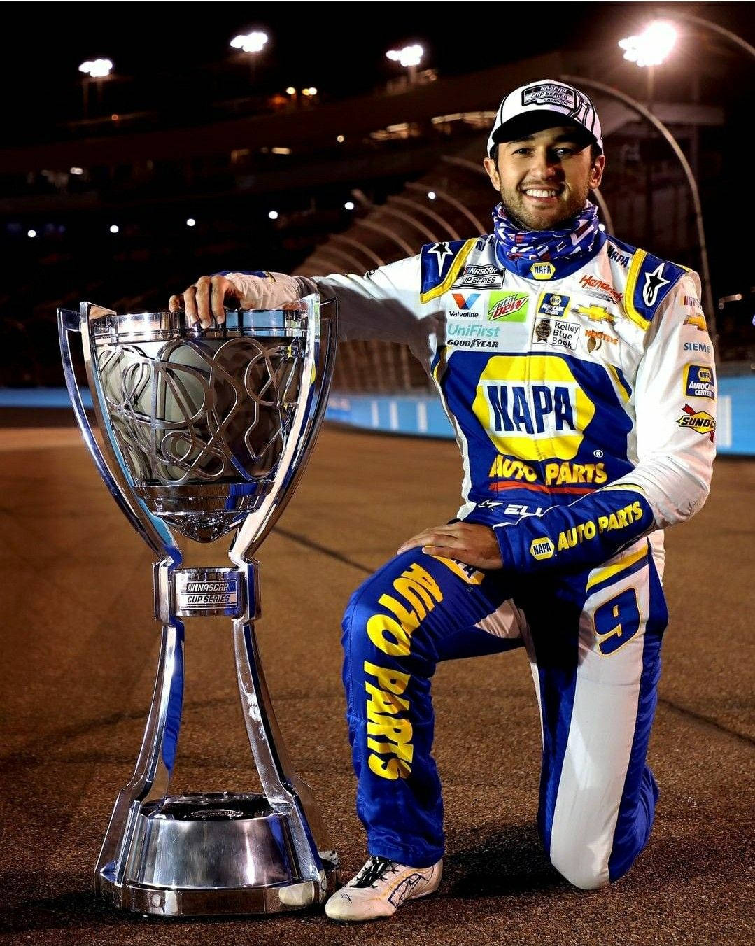 Chase Elliott Celebrating With Trophy Wallpaper