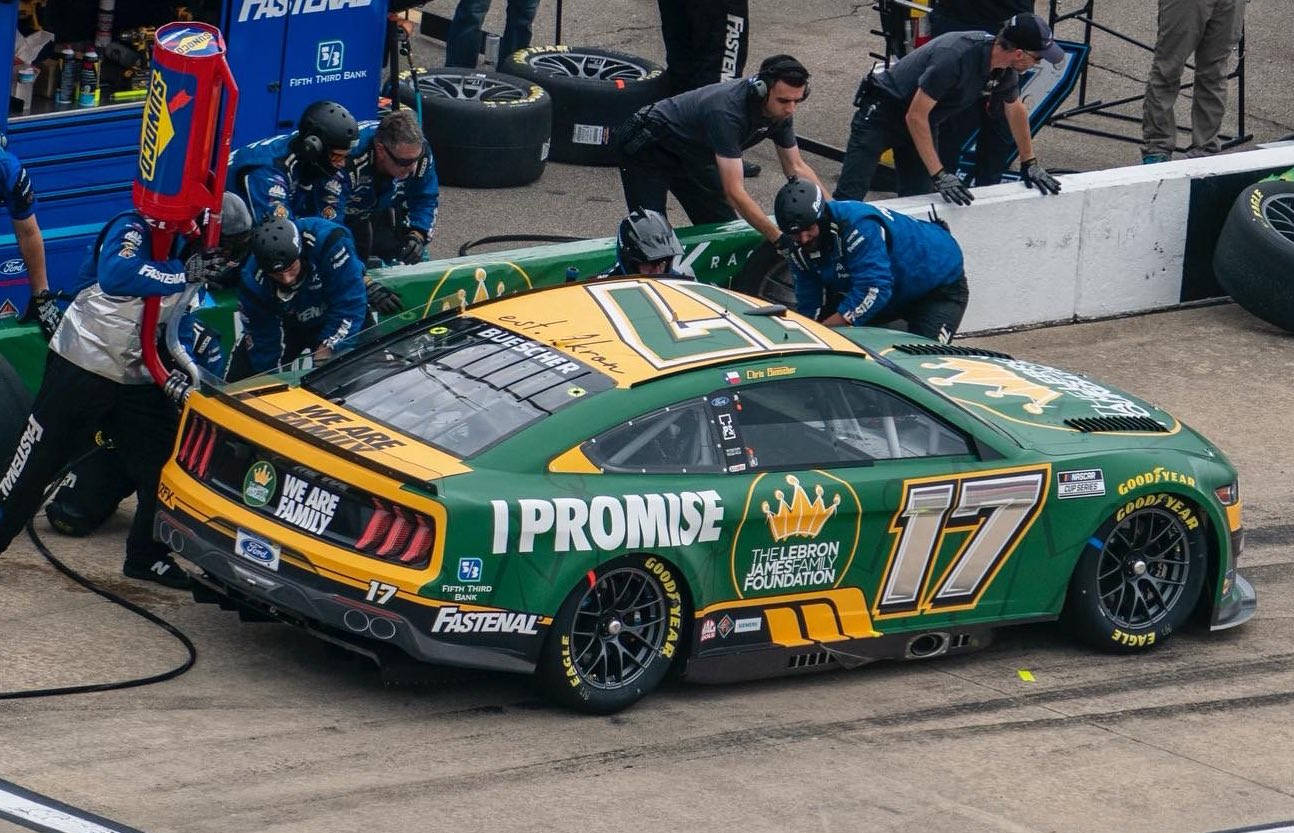 Chris Buescher At A Pit Stop During A Race Wallpaper