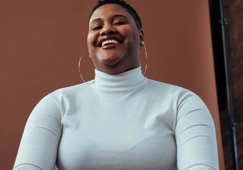 Chubby Nigerian Woman Smiling Wallpaper