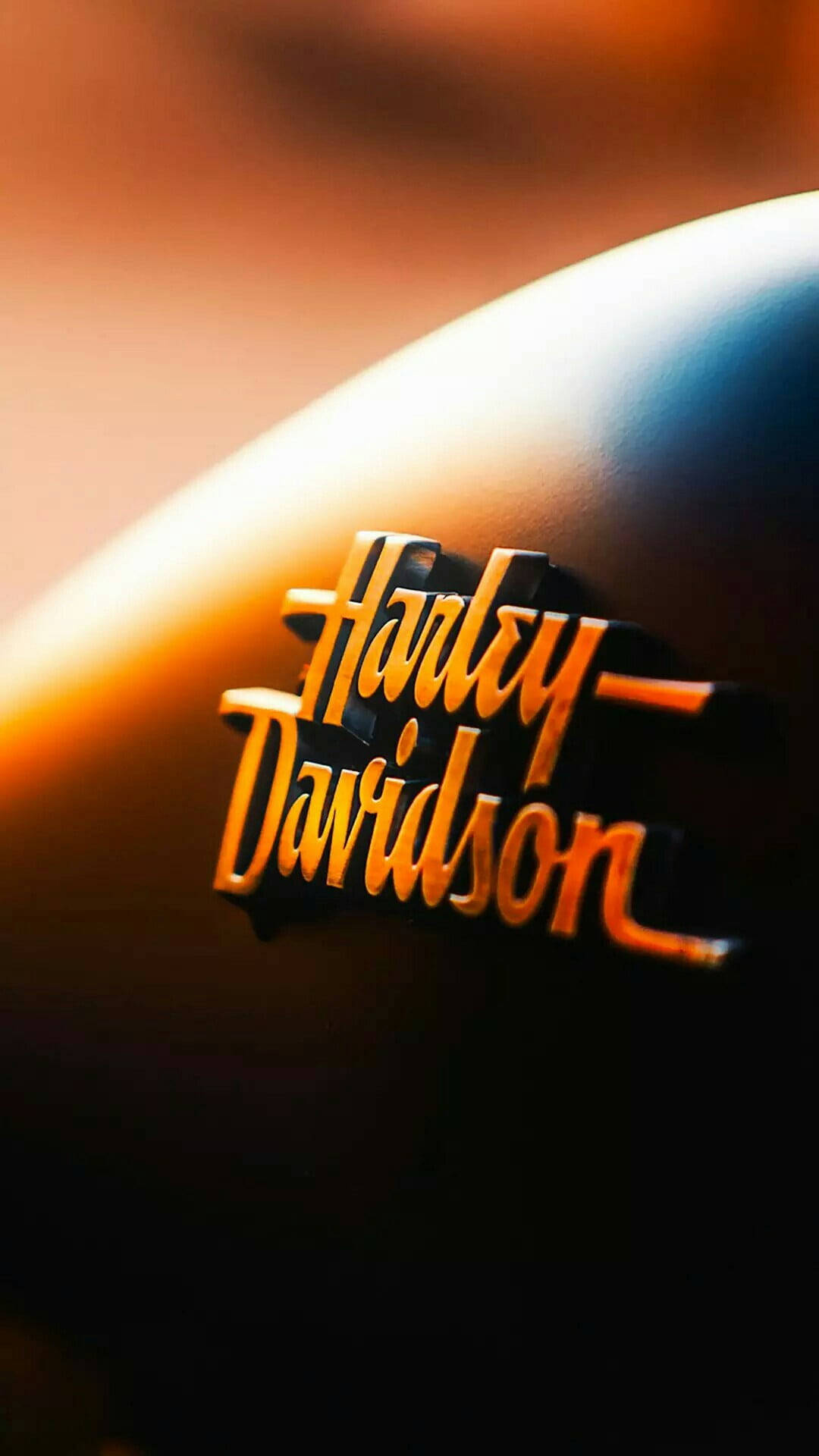 Close-up Orange Harley Davidson Mobile Wallpaper