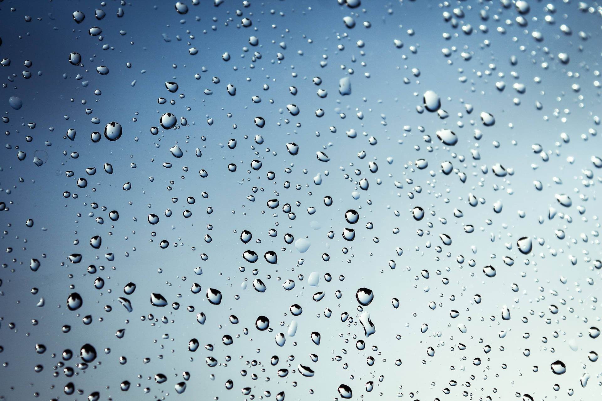 Cold Raindrops On Crystal Glass Surface Wallpaper
