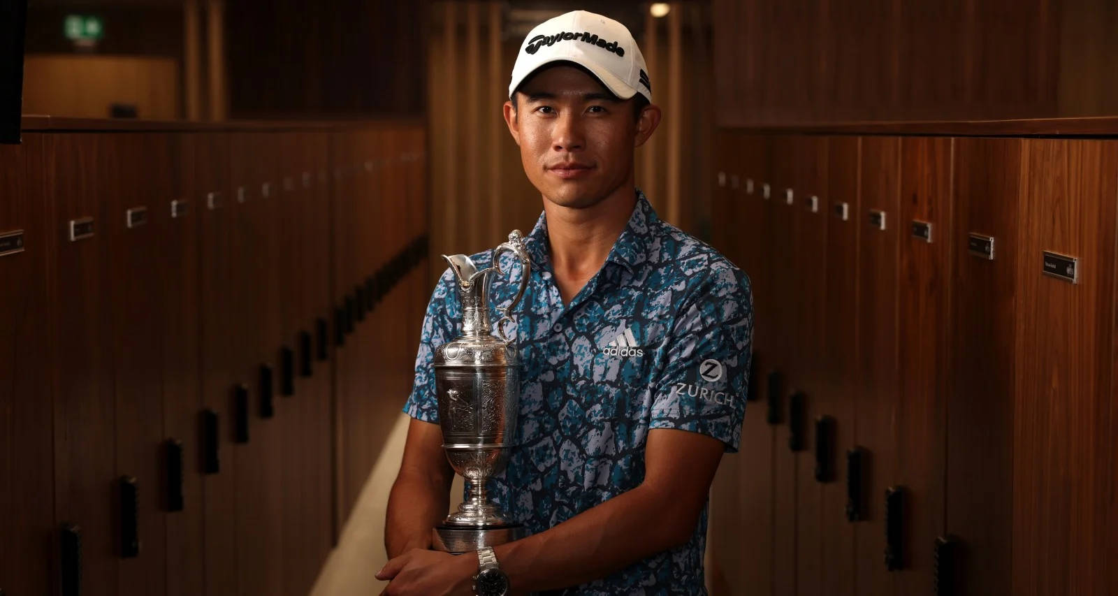 Collin Morikawa Holding A Silver Chalice Wallpaper