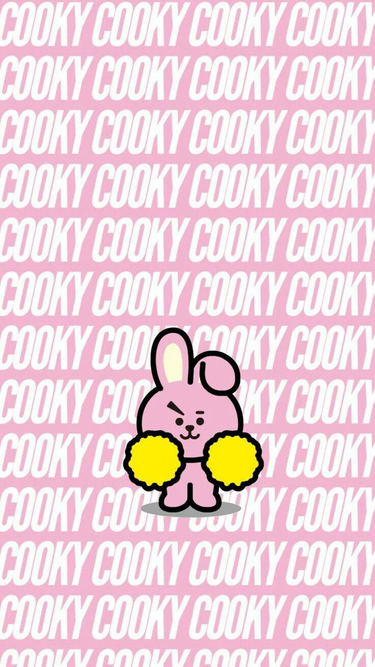 Cooky Bt21 With Yellow Pom-poms Wallpaper