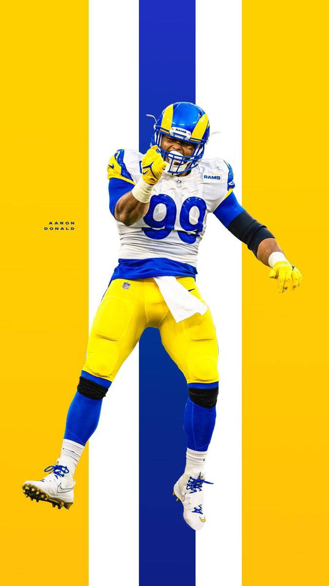 Cool Aaron Donald Blue And Yellow Football Jersey Wallpaper