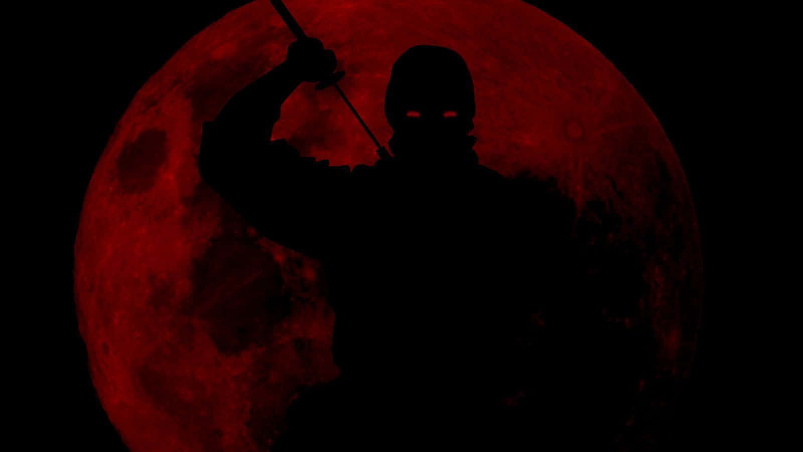 Cool Black Ninja On A Red Moon Wallpaper