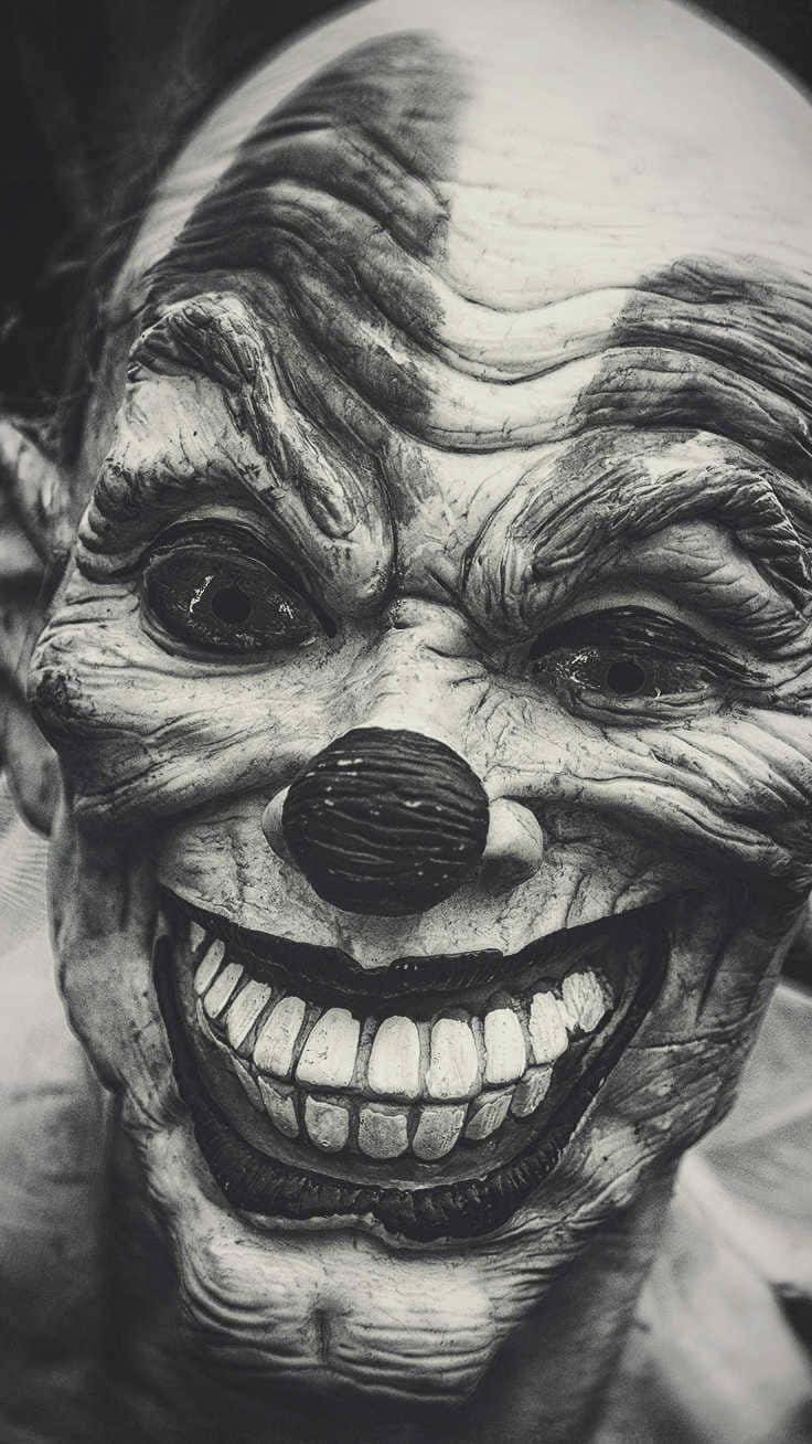 Creepy_ Clown_ Mask_ Laughter.jpg Wallpaper