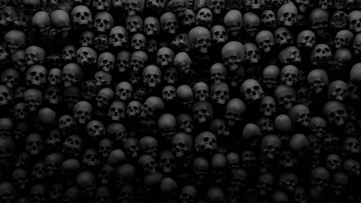 Creepy Dark Skulls Pile Wallpaper