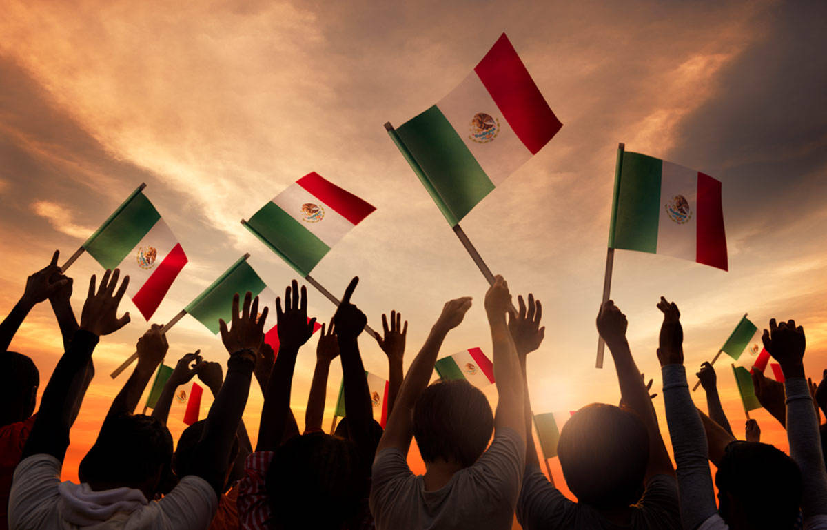 Crowd Of People With Mexican Flags Wallpaper