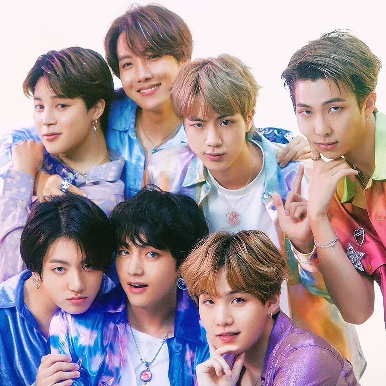 Cute Bts Group In A Medium Shot Wallpaper