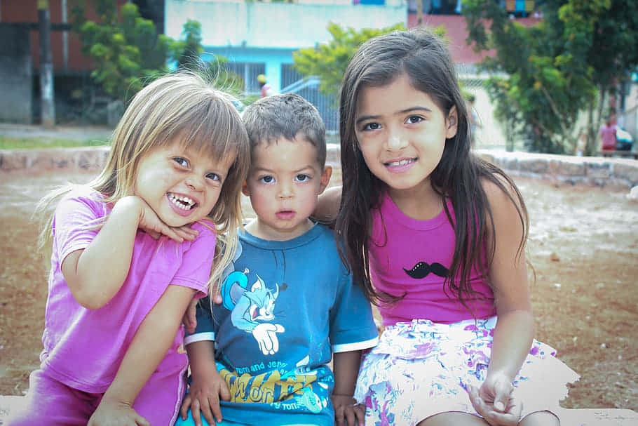 Cute Sister And Siblings Playground Bonding Wallpaper