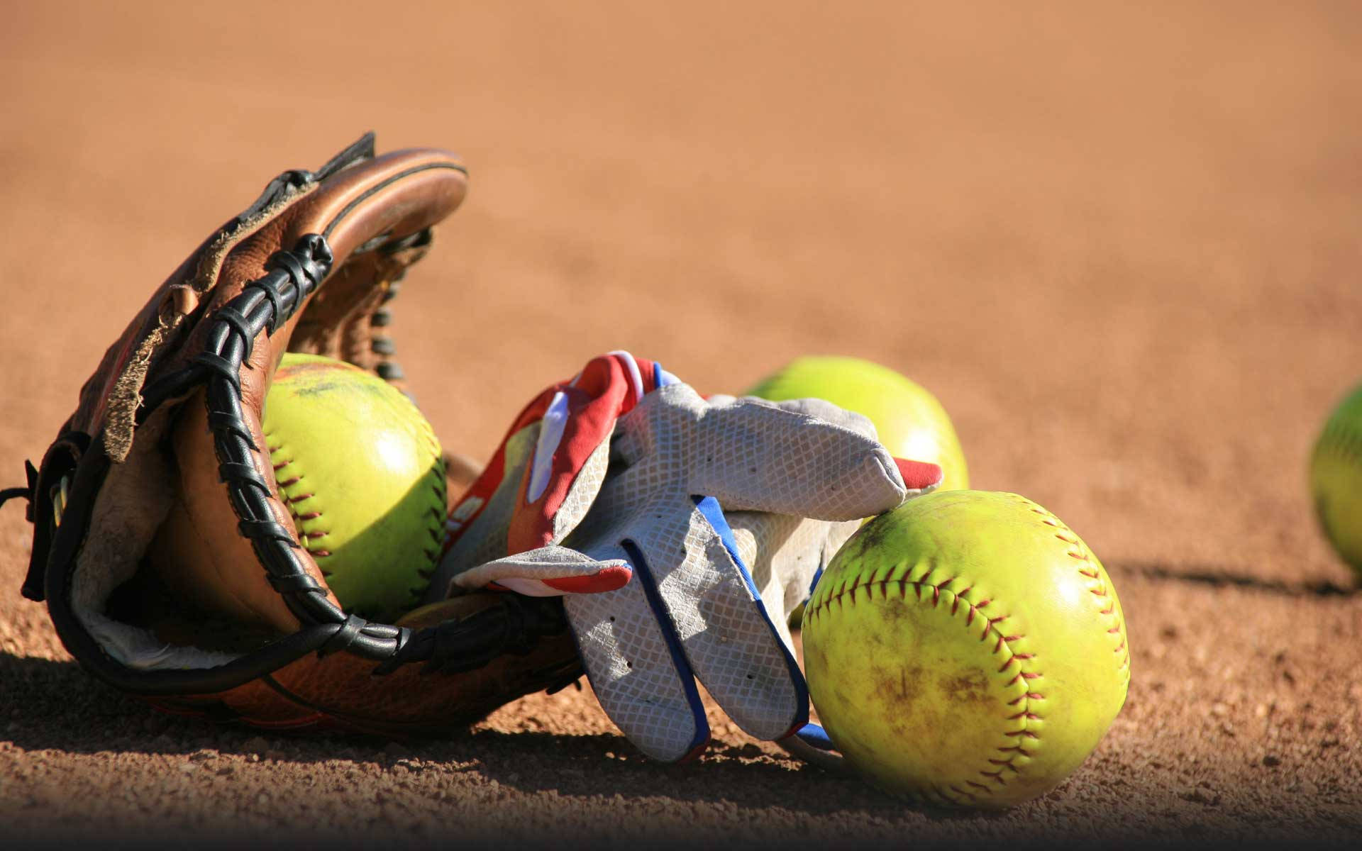 Cute Softball With Gloves Wallpaper