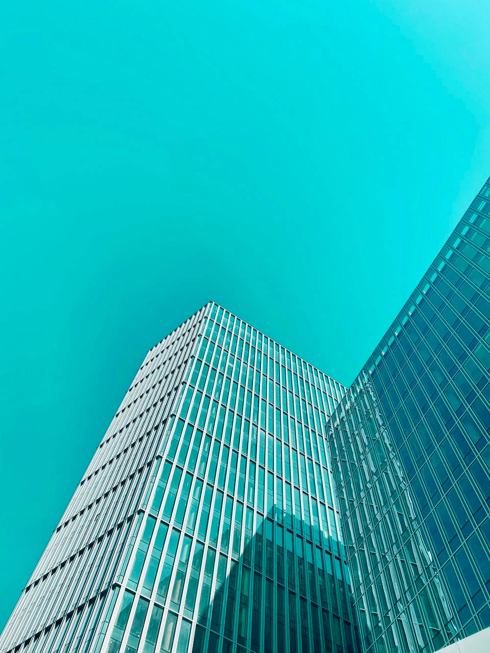 Cyan Sky And Building Wallpaper
