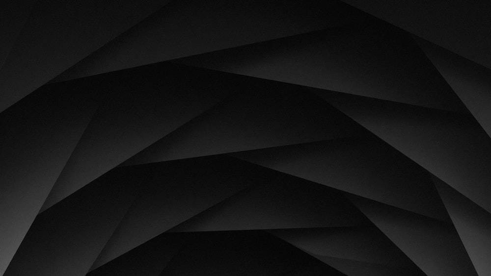 Dark Laptop Polygon Shapes Wallpaper