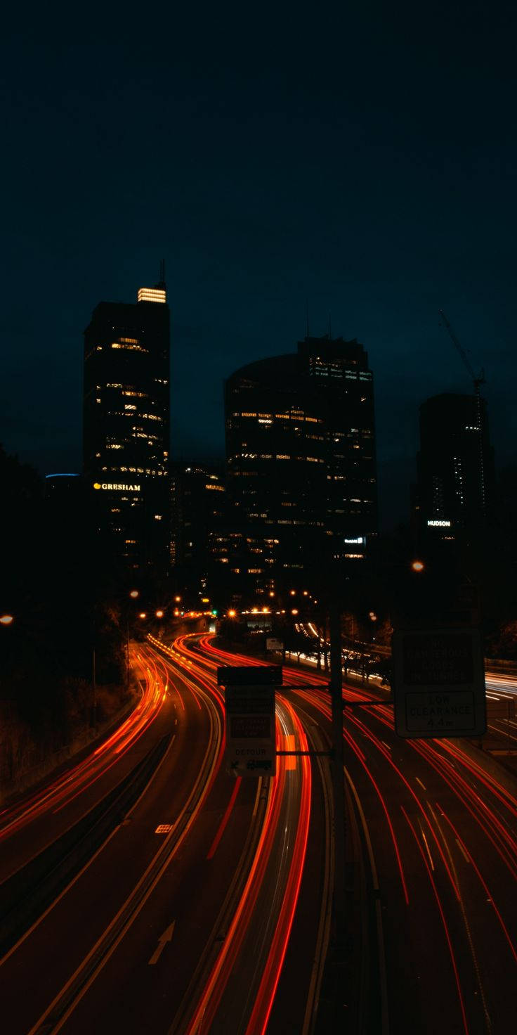 Dark Night And Busy Highway Wallpaper